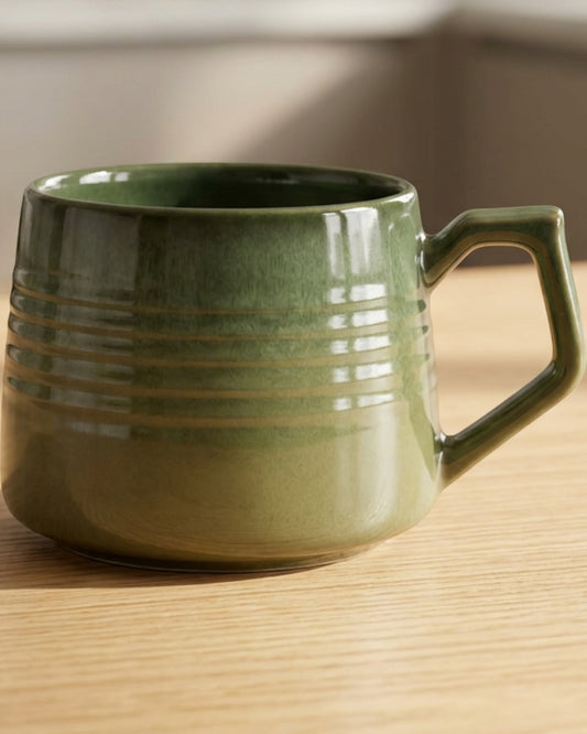 Vaid Reactive-Glaze Wide Ceramic Mug 14 fl oz Moss Green - Lifestyle view