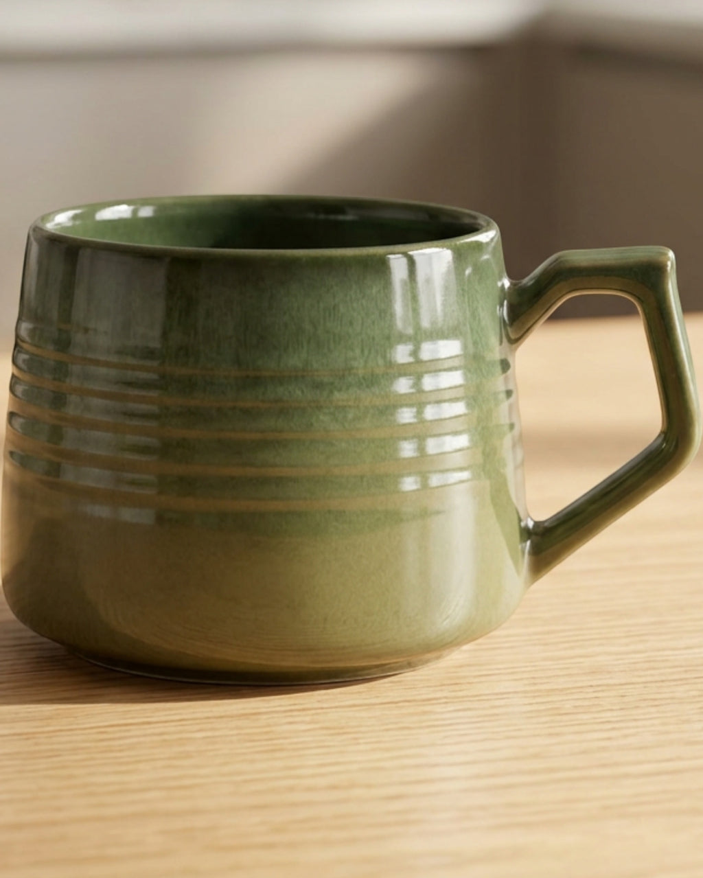 Vaid Reactive-Glaze Wide Ceramic Mug 14 fl oz Moss Green - Lifestyle view