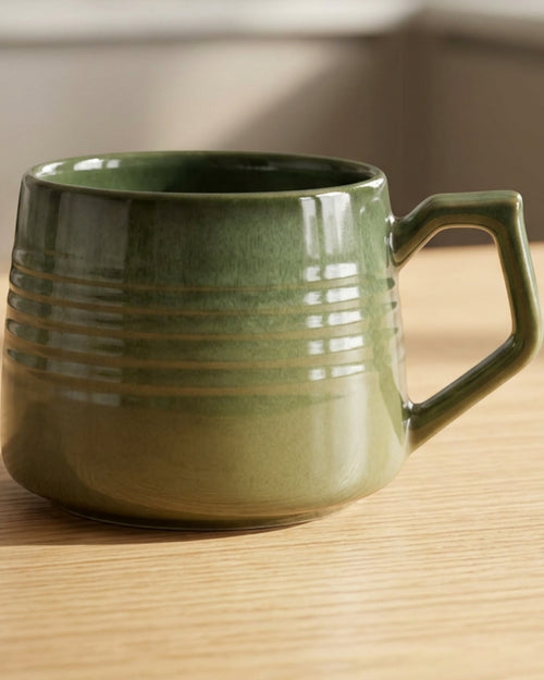 Vaid Reactive-Glaze Wide Ceramic Mug 14 fl oz Moss Green - Lifestyle view